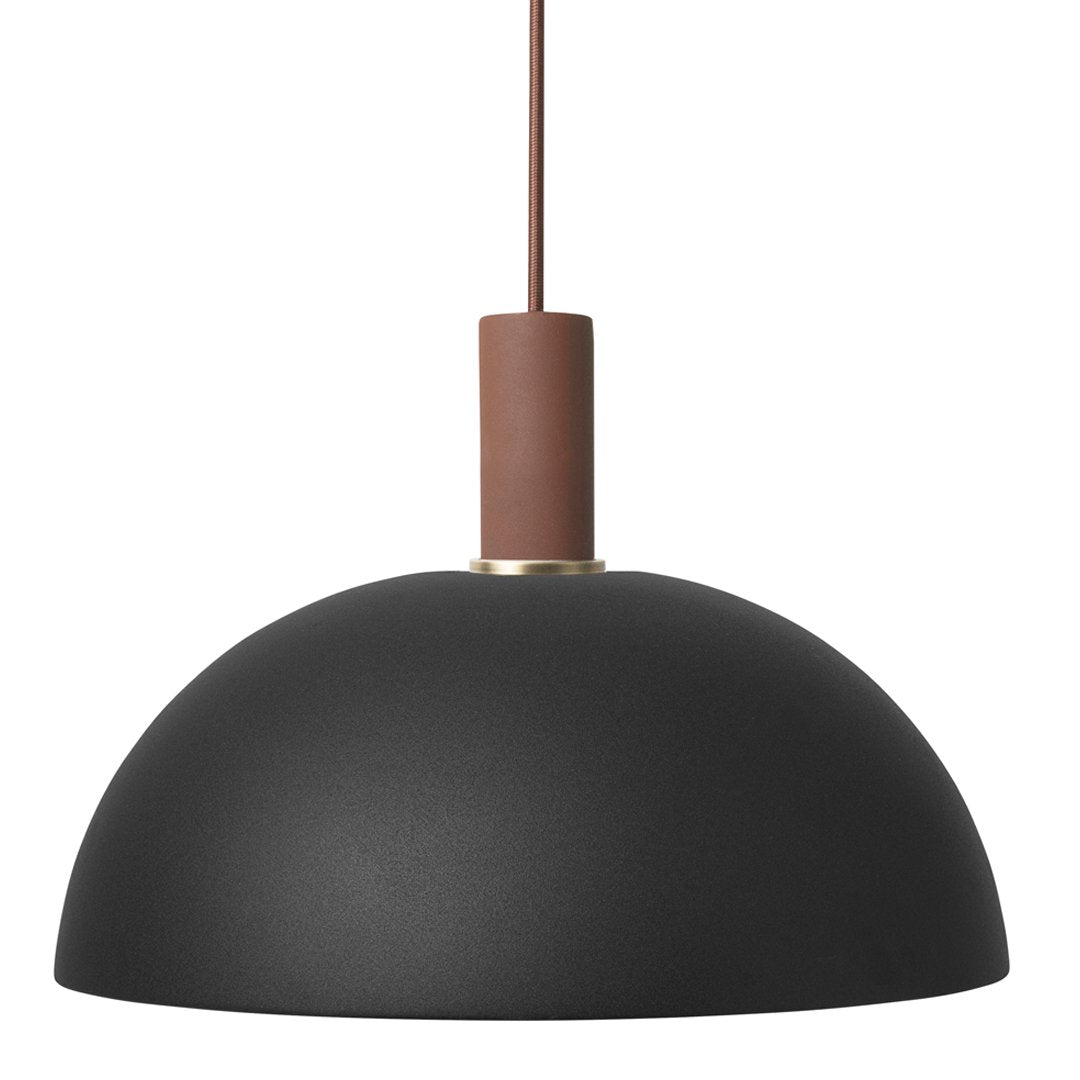 Black dome pendant lamp with a matte finish and a brown accent on the hanging cord. Elegant and modern design.