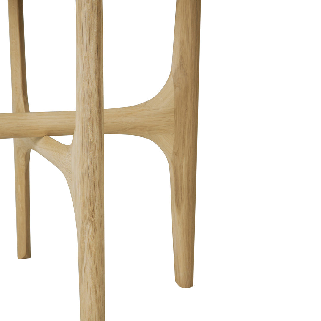 Natural wood finish with smooth, light tones and subtle, organic curves. Ideal for modern minimalist decor.