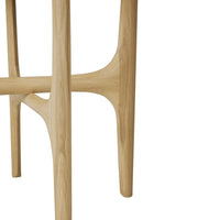 Natural wood finish with smooth, light tones and subtle, organic curves. Ideal for modern minimalist decor.