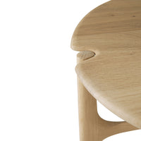 Natural oak wood grain with smooth, curved edges and a seamless join detail, creating a modern and organic look.