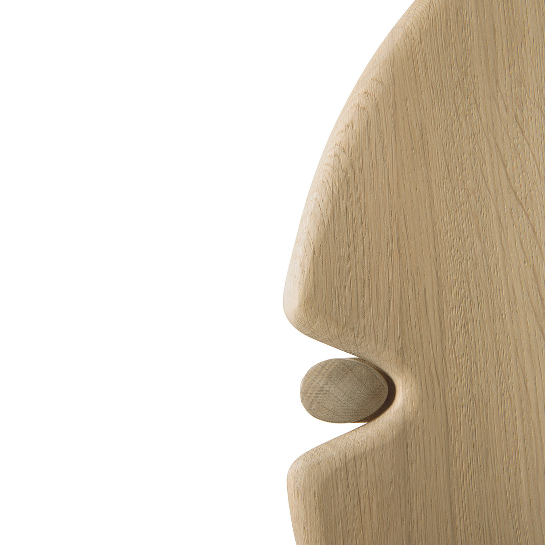 Light oak wood finish with smooth, minimalistic contours and natural grain patterns. Perfect for modern decor.