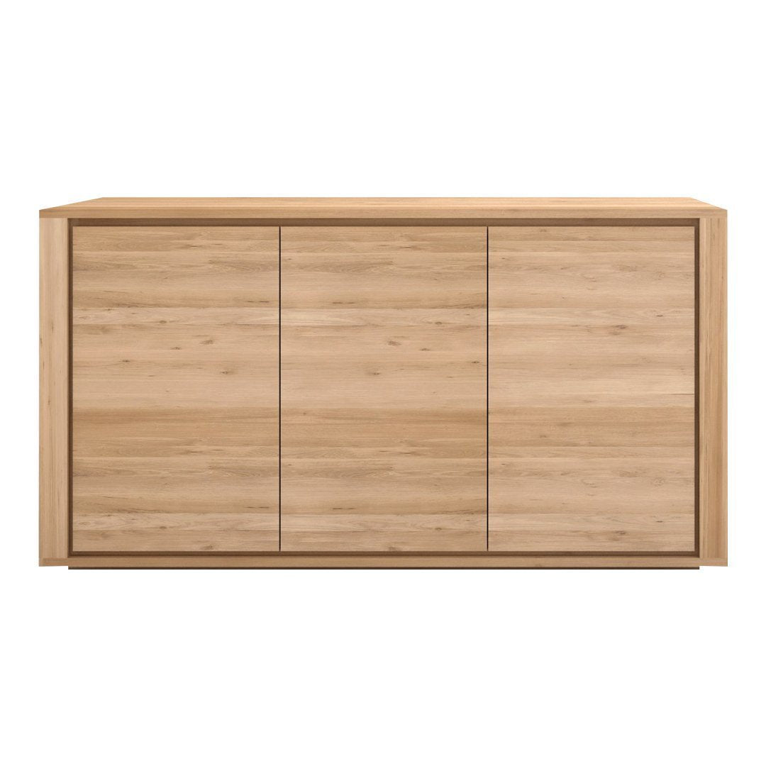 Light oak sideboard with a smooth, natural wood finish and minimalist design, featuring three flat cabinet doors.