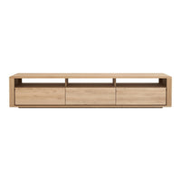 Light oak TV stand with a smooth, natural wood finish and minimalist design, featuring three spacious drawers.