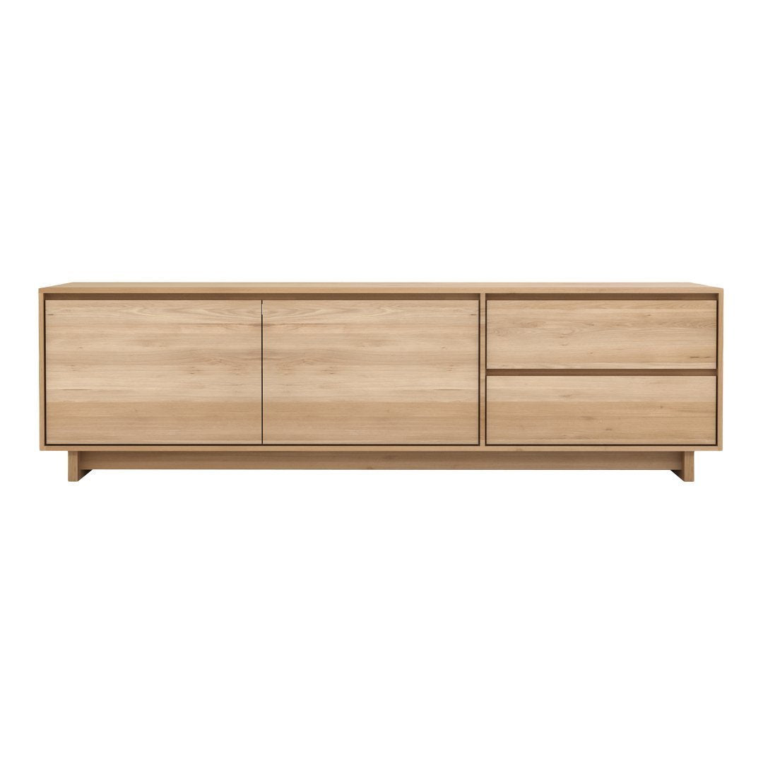 Light oak wood TV cabinet with a smooth finish and minimalist design. Features natural wood grain and subtle texture.