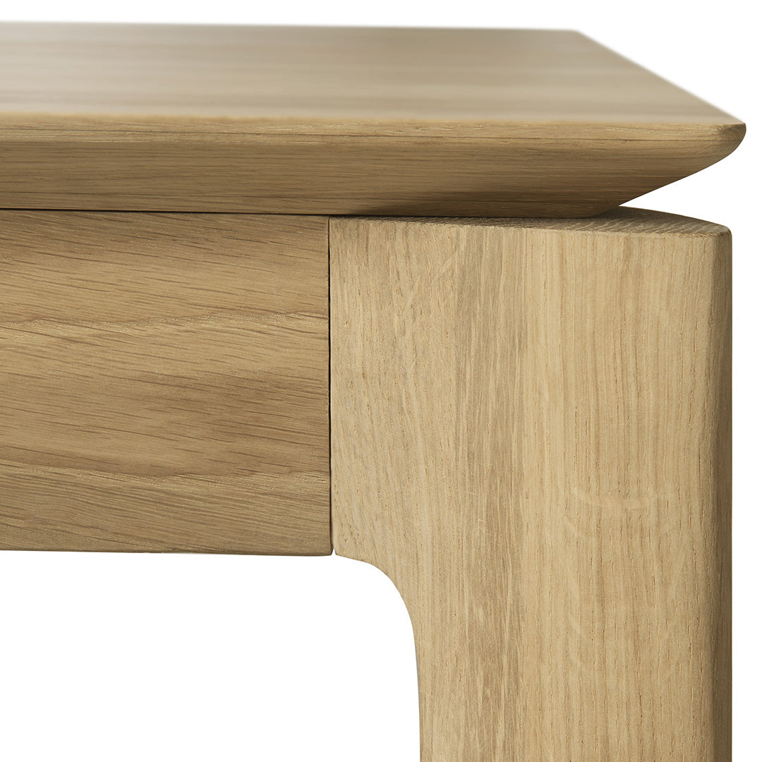 Natural wood grain patterns in light oak, showcasing smooth edges and a seamless finish. Ideal for modern decor.