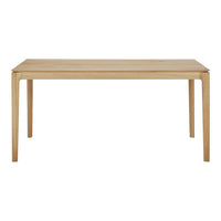 Light oak dining table with a smooth finish and simple, modern design. Ideal for contemporary home decor.