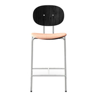 Black wooden chair with a round back, beige seat cushion, and sleek chrome legs. Modern design with minimalistic style.