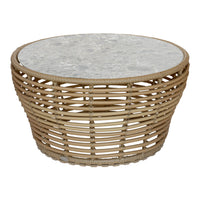 Natural rattan woven basket design with a textured white marble top, combining earthy tones and soft patterns.
