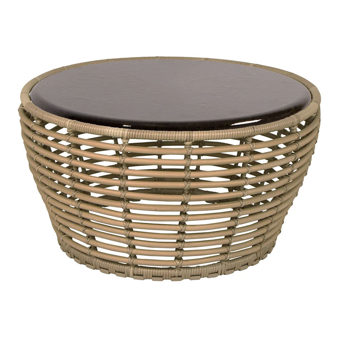 Round woven coffee table with natural beige rattan base and a glossy dark brown top. Stylish and modern design.