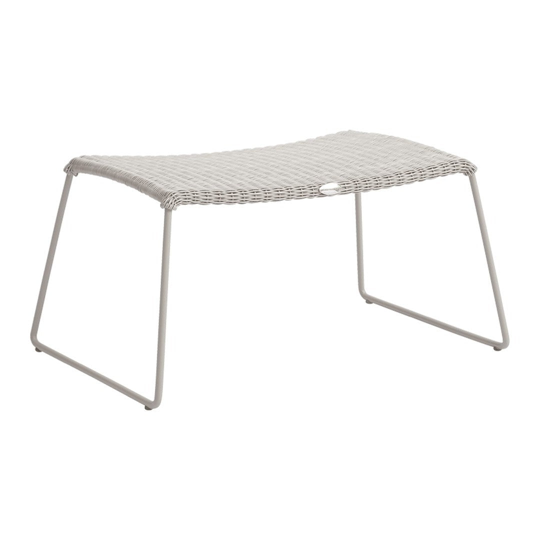 Light gray woven patio ottoman with a sleek, minimalist design and sturdy white frame.