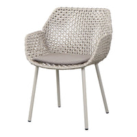 Light beige woven chair with a smooth gray cushion and minimalistic metal legs, perfect for modern decor.