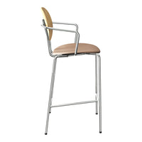 "Modern bar stool with a sleek chrome frame, light wood backrest, and tan padded seat for a stylish touch."