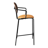 Stylish black metal bar stool with a tan wooden seat and curved backrest, blending modern and minimalist design.