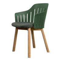 Green modern chair with slatted back and gray upholstered seat, complemented by natural wood legs.