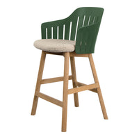 Green slatted back bar stool with a beige cushioned seat and natural wood legs. Modern designer chair.