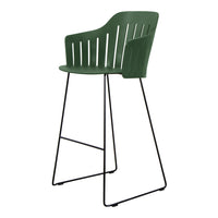 Green slatted back bar stool with a sleek black metal frame. Modern design perfect for stylish décor.