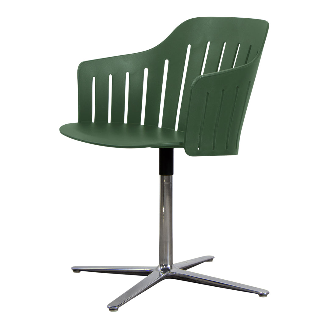 Green modern chair with vertical slits and a chrome base. Stylish design perfect for contemporary spaces.