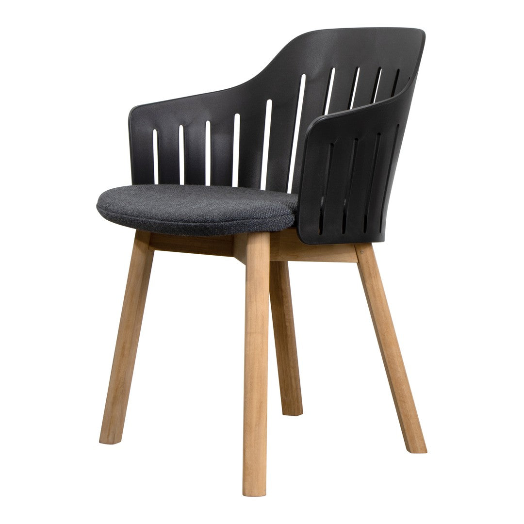 Black slatted chair with a gray upholstered seat and natural wood legs, offering a modern, stylish look.