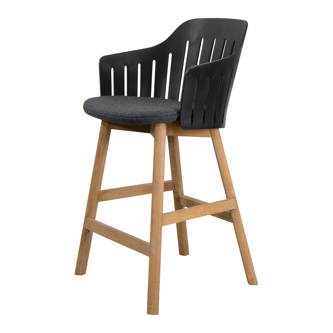 Black slatted back bar stool with a gray cushion and natural wood legs, blending modern and classic design elements.