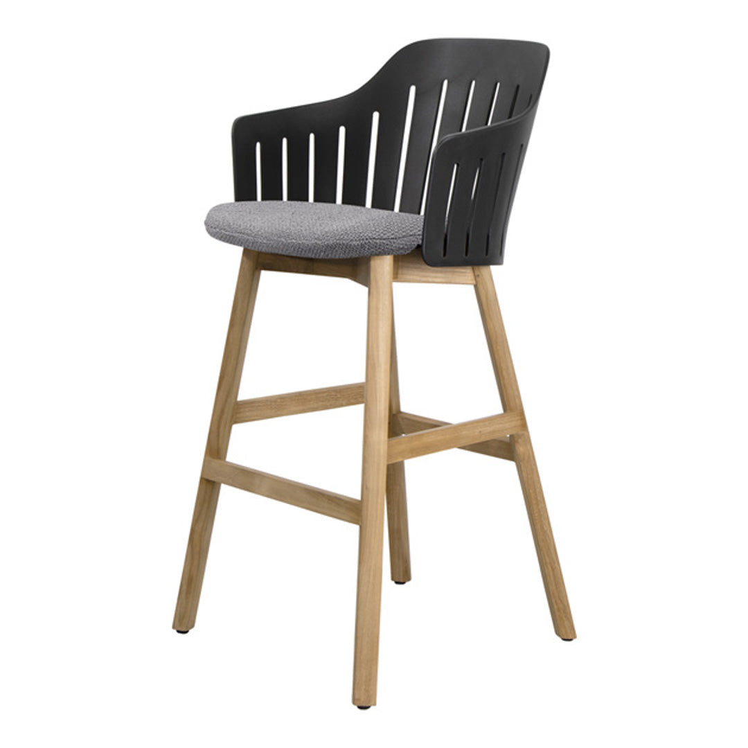 Black slatted back bar stool with a grey upholstered seat and natural wood legs. Modern design with a sleek finish.