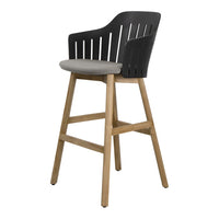 Stylish black slatted back chair with a gray cushion and natural wood legs, perfect for modern decor.