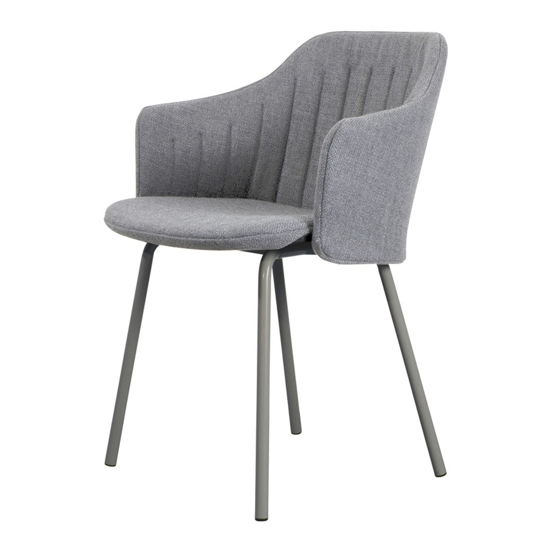 Gray upholstered chair with vertical stitching and sleek metal legs, perfect for modern decor.