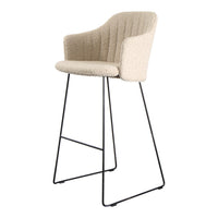 Beige high-back bar chair with textured fabric and black metal legs. Ideal for modern interiors.