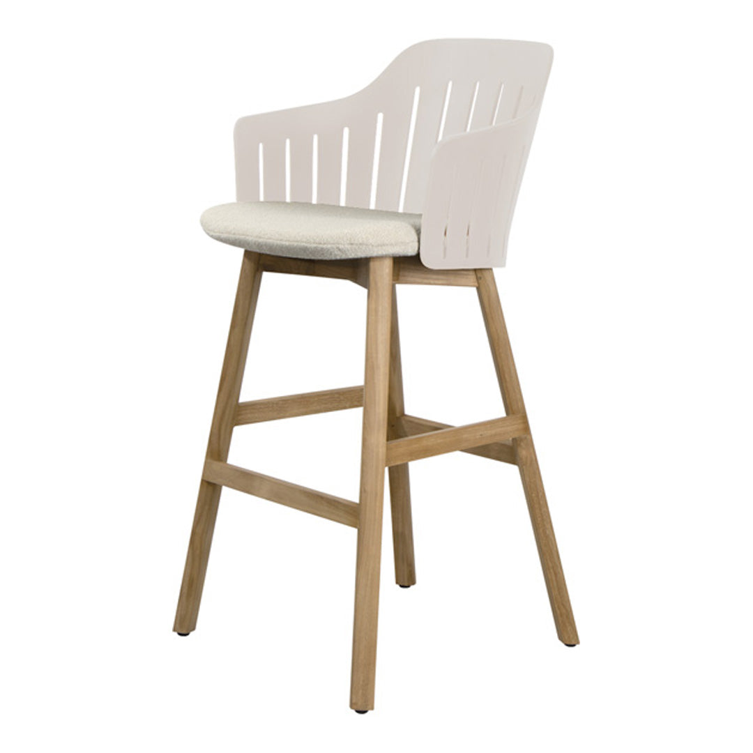 White and cream bar stool with a slatted back and natural wood legs, featuring a minimalist design.