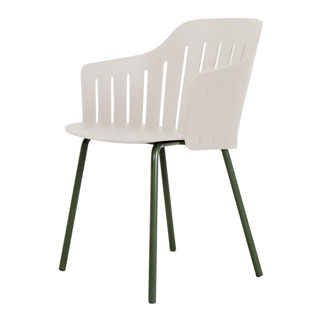 Light beige chair with vertical slats and green metal legs, showcasing a modern, minimalist design.