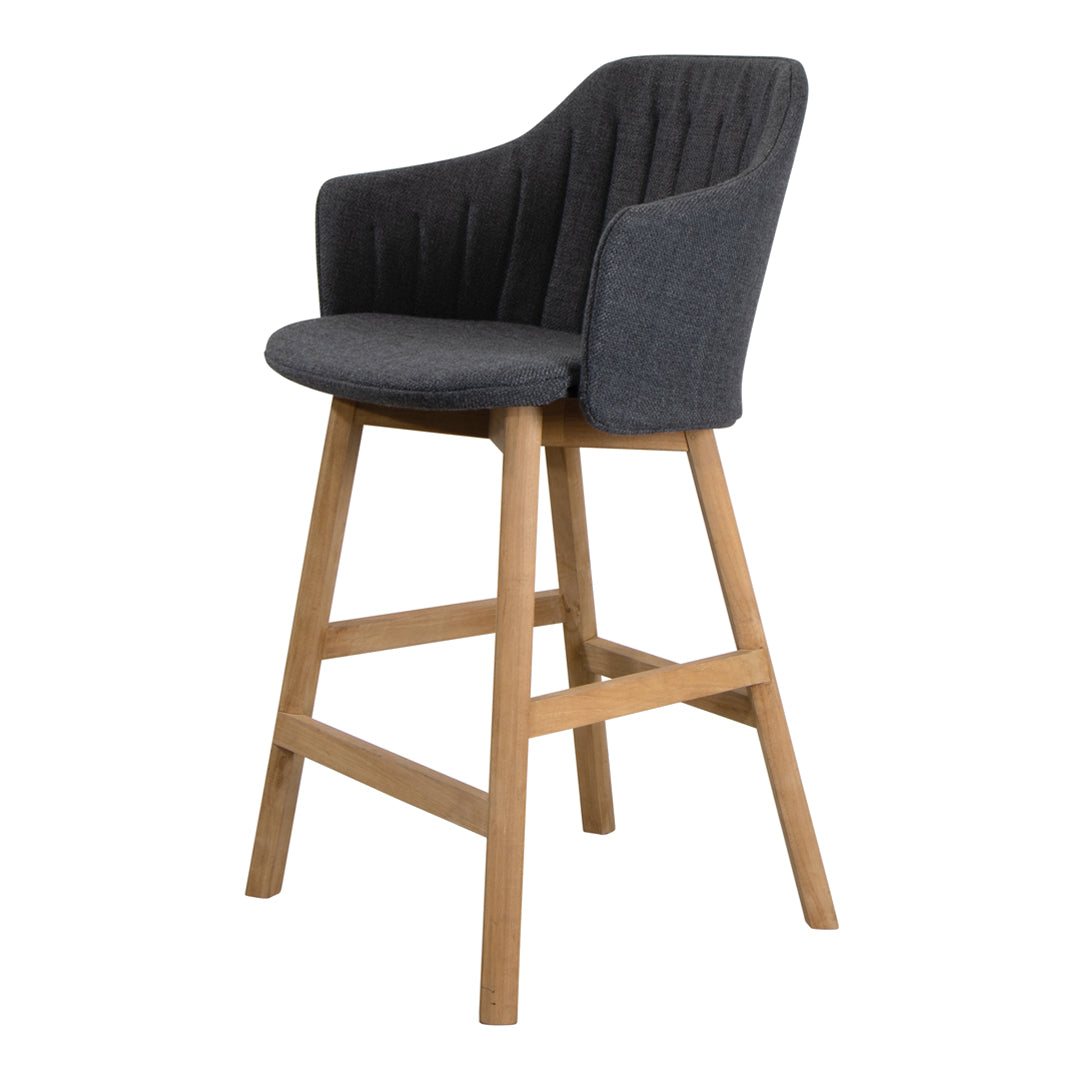 Stylish gray upholstered bar stool with vertical ribbed pattern and natural wood legs, perfect for modern decor.