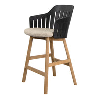 Black and beige bar stool with a slatted back and natural wood legs, featuring a soft, textured seat cushion.
