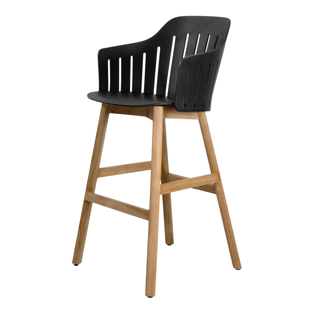 Black slatted high chair with natural wood legs, featuring a modern design and minimalist aesthetic.