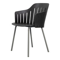 Black slatted chair with a modern design, featuring a smooth finish and sleek metallic legs for a contemporary look.