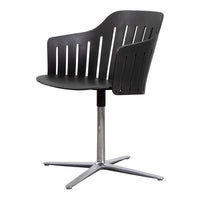 Black plastic chair with vertical slats and chrome metal base, featuring a sleek, modern design. Perfect for contemporary spaces.