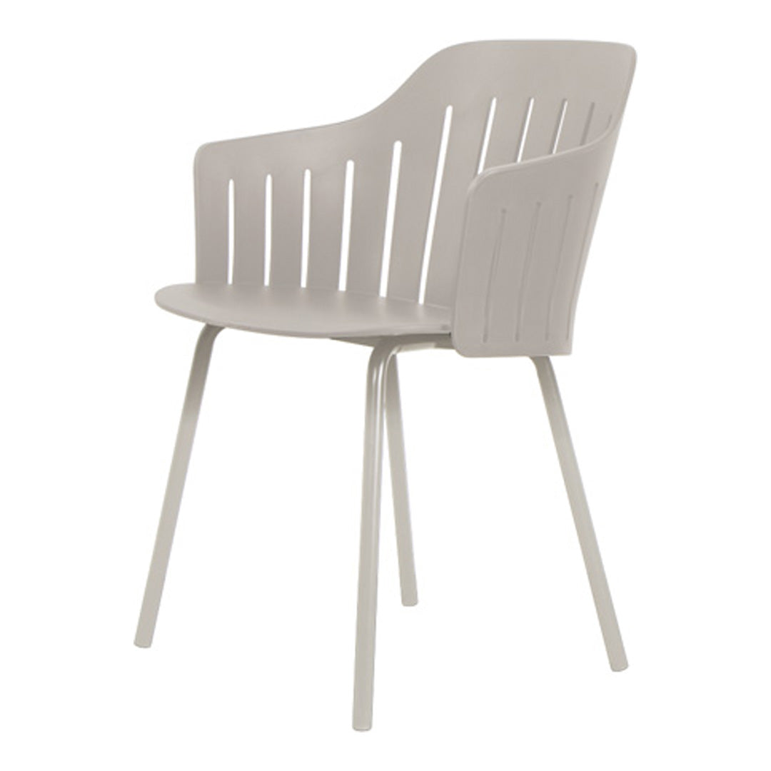 Light gray armchair with a modern slatted design and sleek, minimalist legs. Ideal for contemporary spaces.