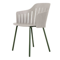 Light gray chair with vertical slats, featuring a green metal base for a modern and stylish look.