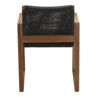 Black woven backrest on a wooden chair, showcasing a minimalist design with natural tones and textures.