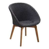 Gray woven chair with rounded shape and light wood legs, featuring a textured pattern for a modern look.