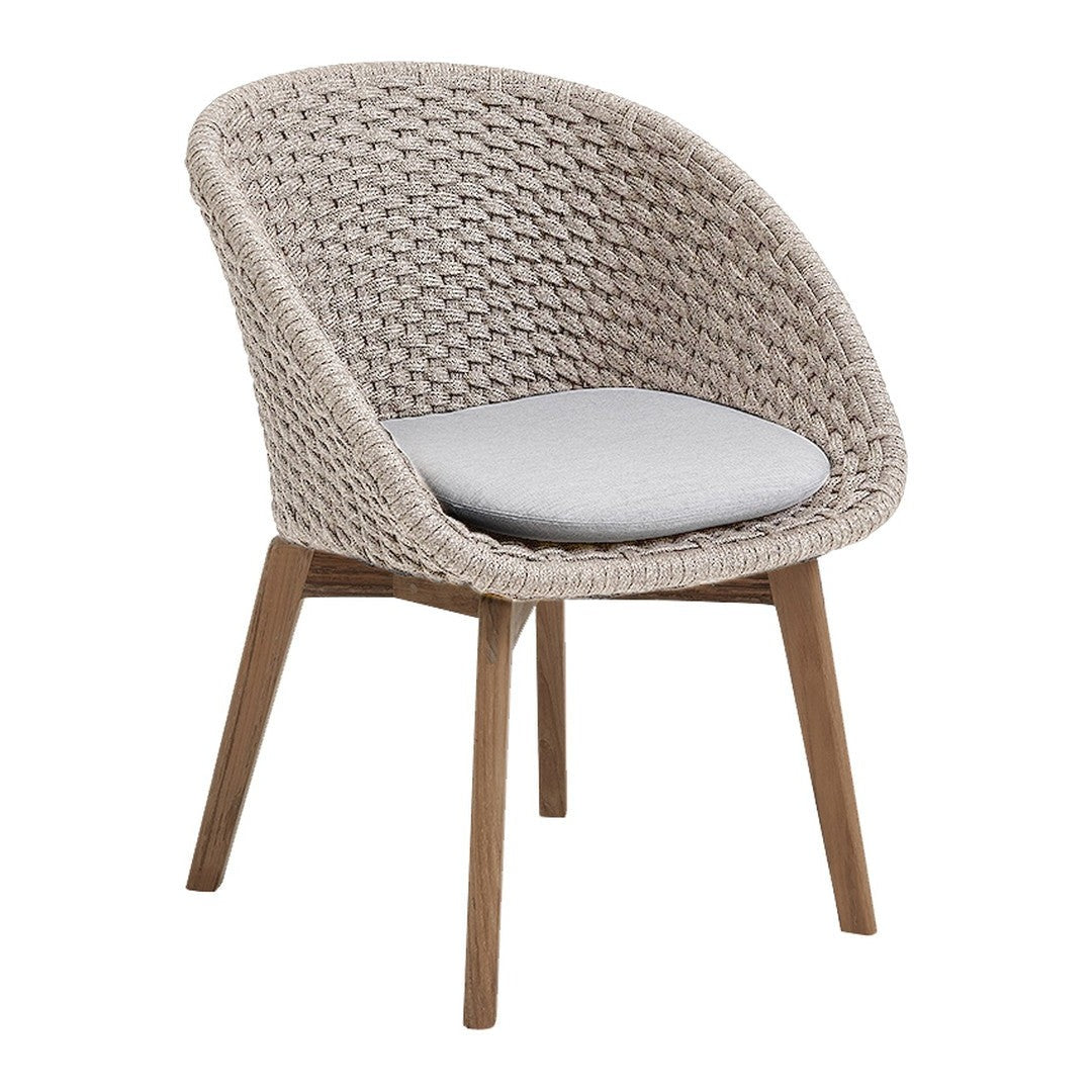 Woven beige chair with gray cushion and light brown wooden legs. Modern, minimalist design.