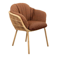Brown upholstered chair with a textured pattern and natural rattan frame, perfect for modern decor.