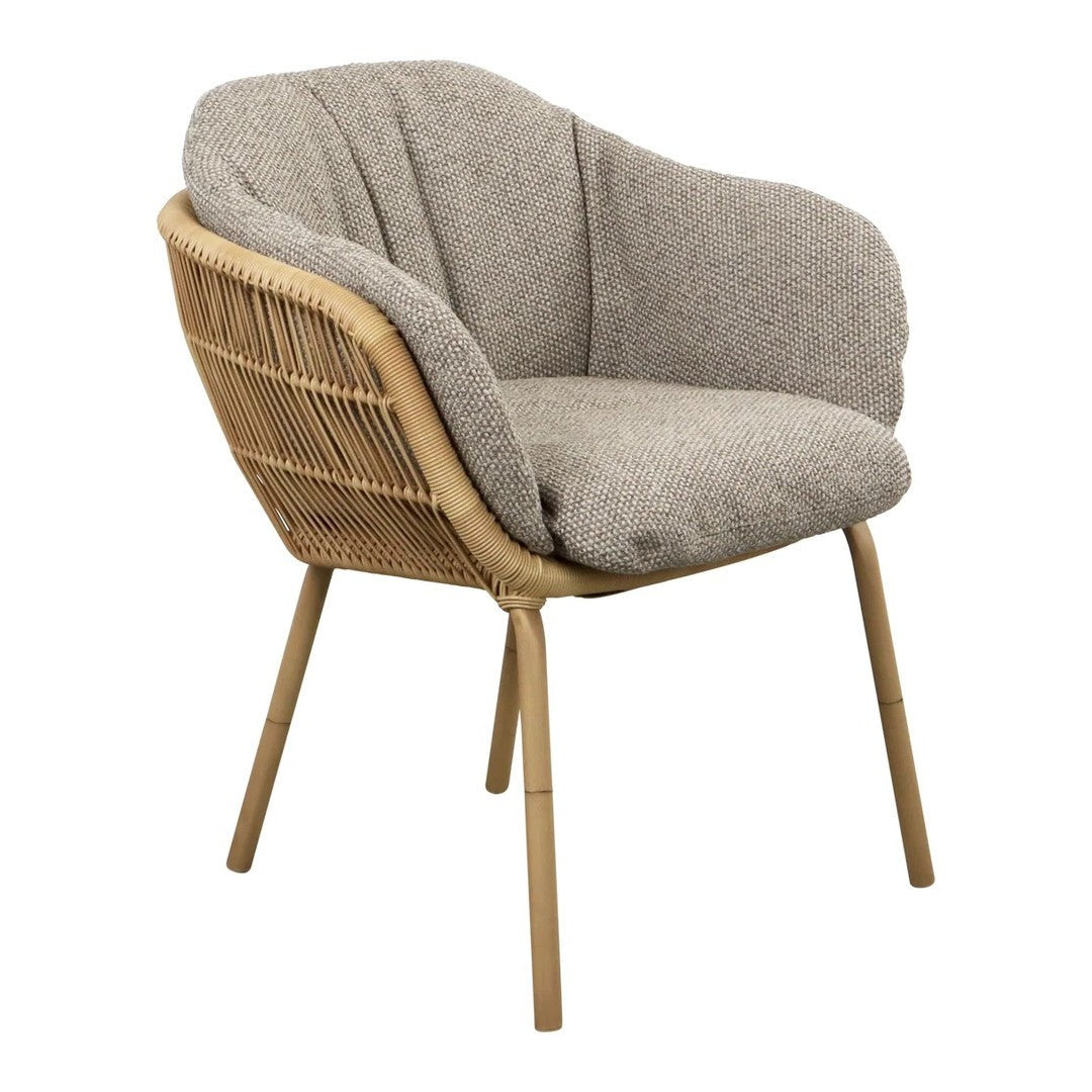 Gray plush chair with a woven rattan back, featuring natural wooden legs and a smooth, cozy texture.