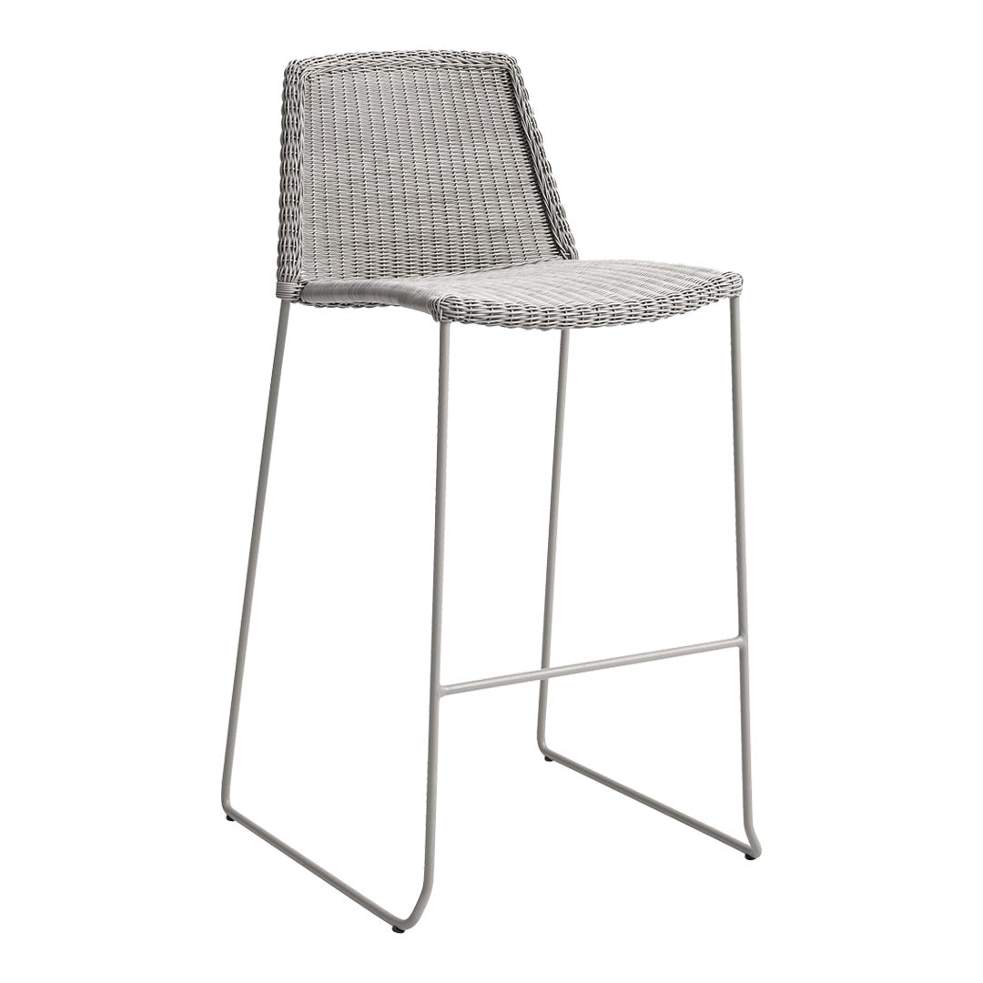Gray woven bar stool with a minimalist design and sleek metal legs, perfect for modern decor.