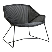 Black woven chair with a sleek, modern design and geometric patterns, featuring a sturdy metal frame.