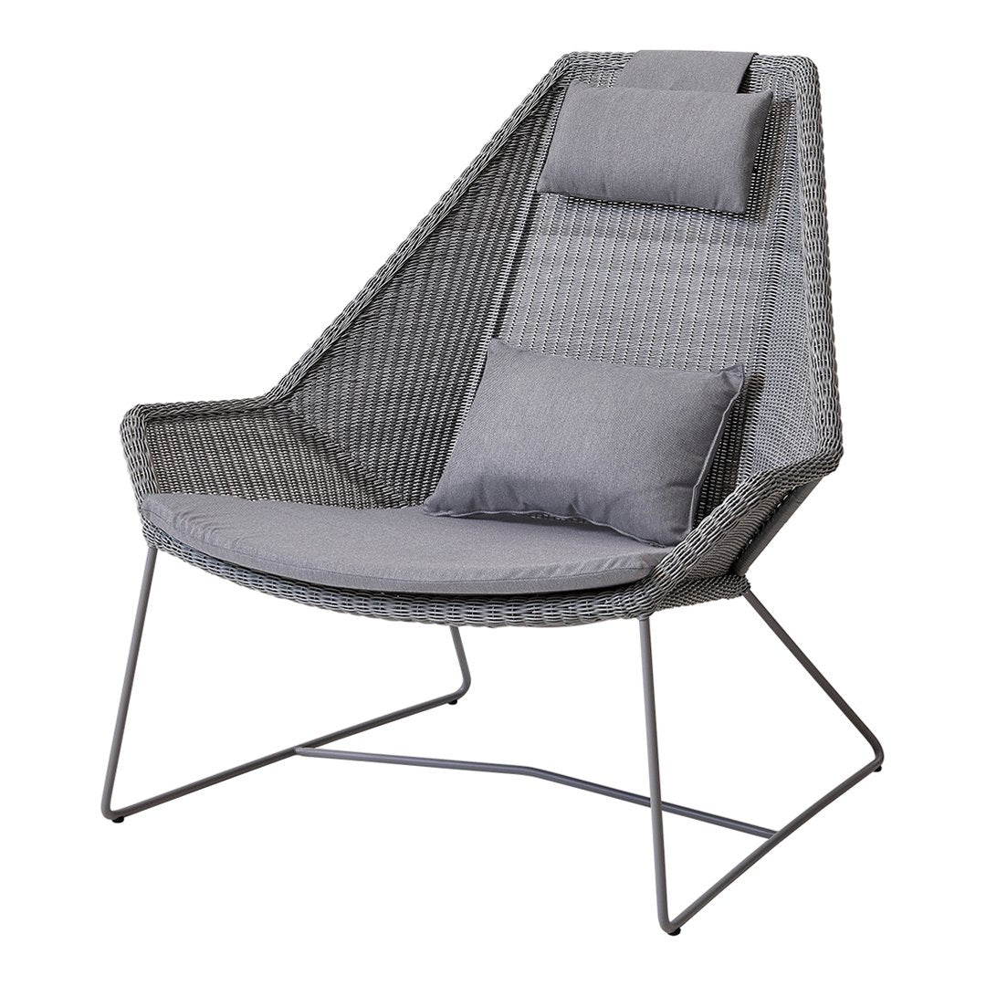Stylish gray woven chair with a modern geometric design and plush gray cushions for added comfort.