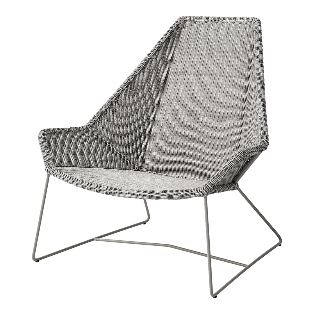 Gray woven lounge chair featuring a modern geometric pattern and sleek metal legs. Perfect for contemporary decor.