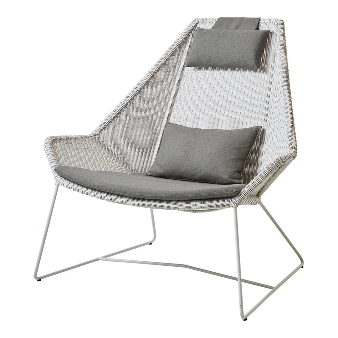 Stylish white and gray chair with vertical textured patterns and plush cushions, perfect for modern decor.