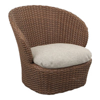 Brown woven wicker chair with a light beige cushion, featuring a curved, modern design. Ideal for indoor or outdoor use.