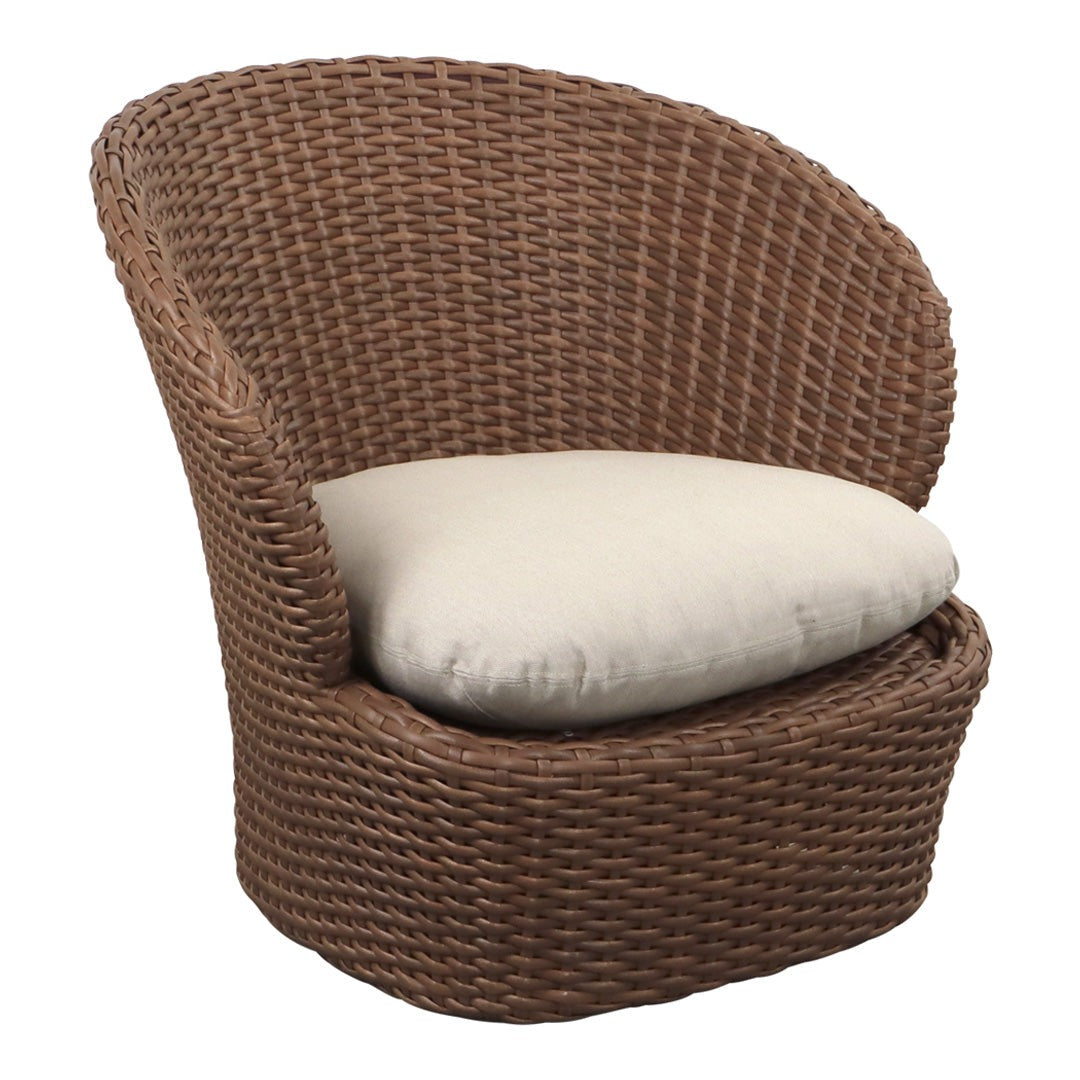 "Brown wicker chair with a smooth cream cushion, featuring a rounded, textured design."