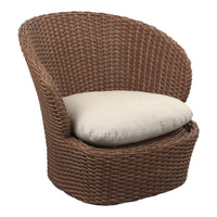 "Brown wicker chair with a smooth cream cushion, featuring a rounded, textured design."