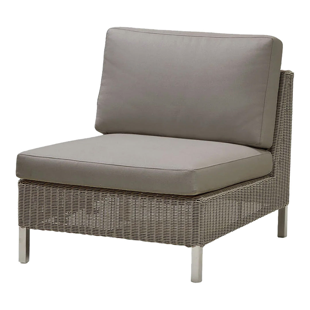 Gray cushioned lounge chair with woven textured base, perfect for modern outdoor settings.